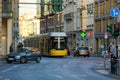 Yellow tram drives along a street. The Berlin tramway German: StraÃÅ¸enbahn Berlin is the main